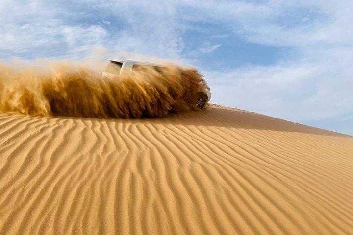 Abu Dhabi Morning Desert Safari with Camel Ride & Sandboarding - cover photo
