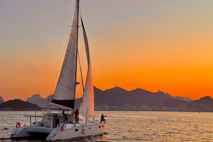 Private Tour: 5 hrs in Catamaran Sailboat with BBQ and Open Bar- Velas do Rio - cover photo
